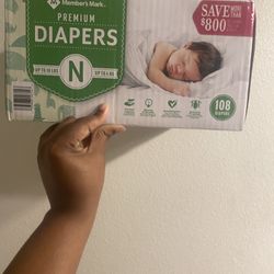 Newborn Diapers And 5 Cans Of Similac 