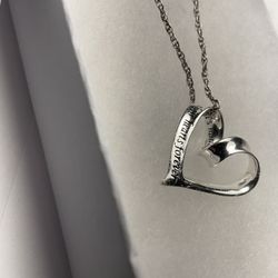 Solid sterling silver necklace open heart shape pendant engraved with "A Mother holds her child's heart forever" Chain and pendant are stamped 925  Ap
