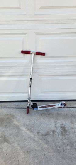Like New Razor Scooter ( Adjustable Height). Price Firm!
