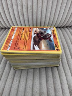 Big stack of pokemon cards
