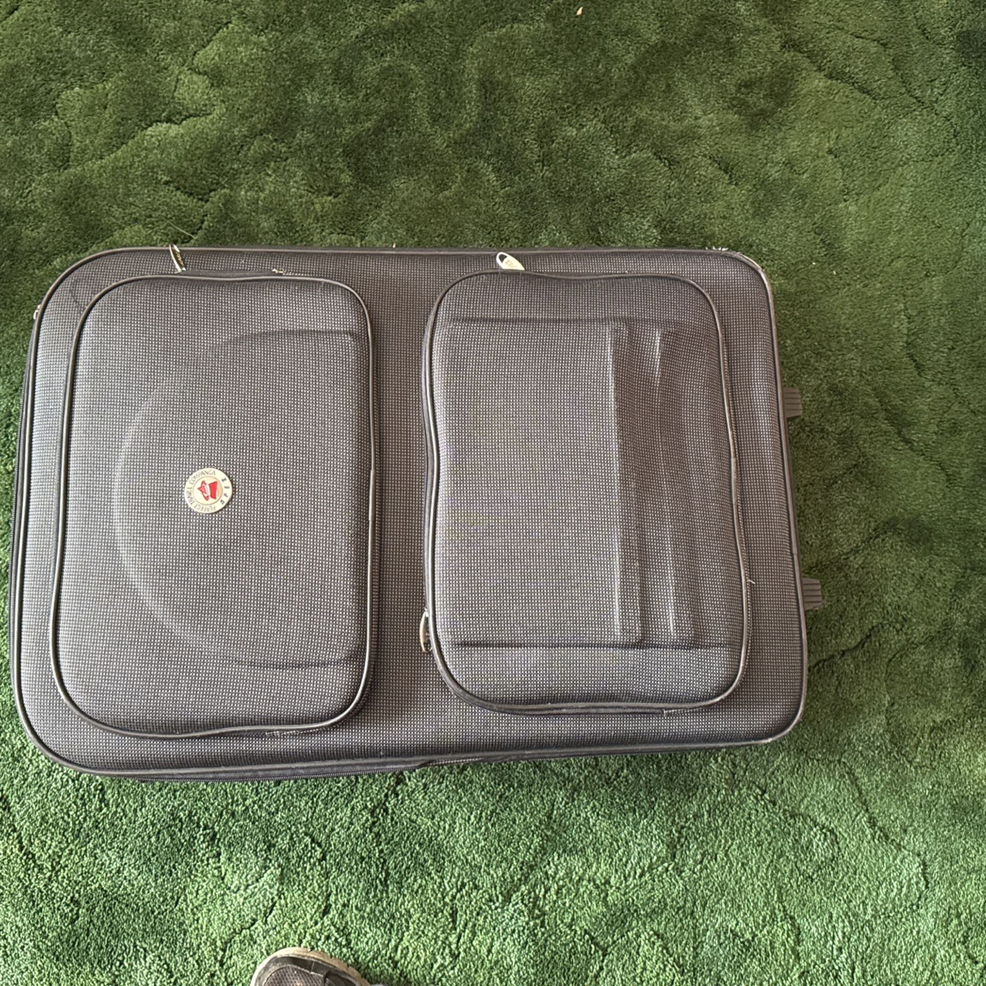 Large Suitcase On Wheels