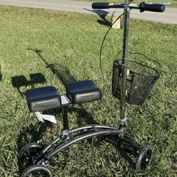Drive Medical Dual Pad Steerable Knee Walker with Basket. 