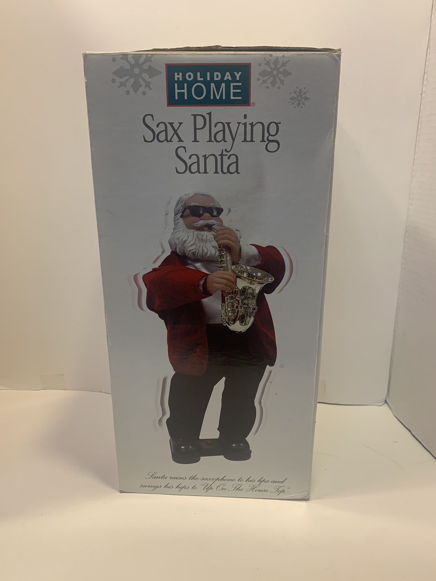 Holiday Home Sax Playing Santa-moves to “Up On The House Top”. Vintage Excellent condition Santa plays the saxophone and dances! Tested and working.