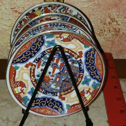 4 amazing detailed vintage petite asian oriental porcelain plates on black dish rack