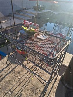 Back yrd bar metal with 2 swivel chairs