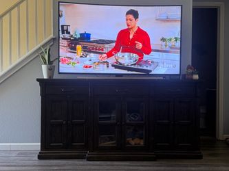 Dark brown tv stand.