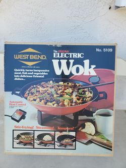 vintage West Bend Electric Wok, model 5109, featuring a Mandarin Red color scheme.