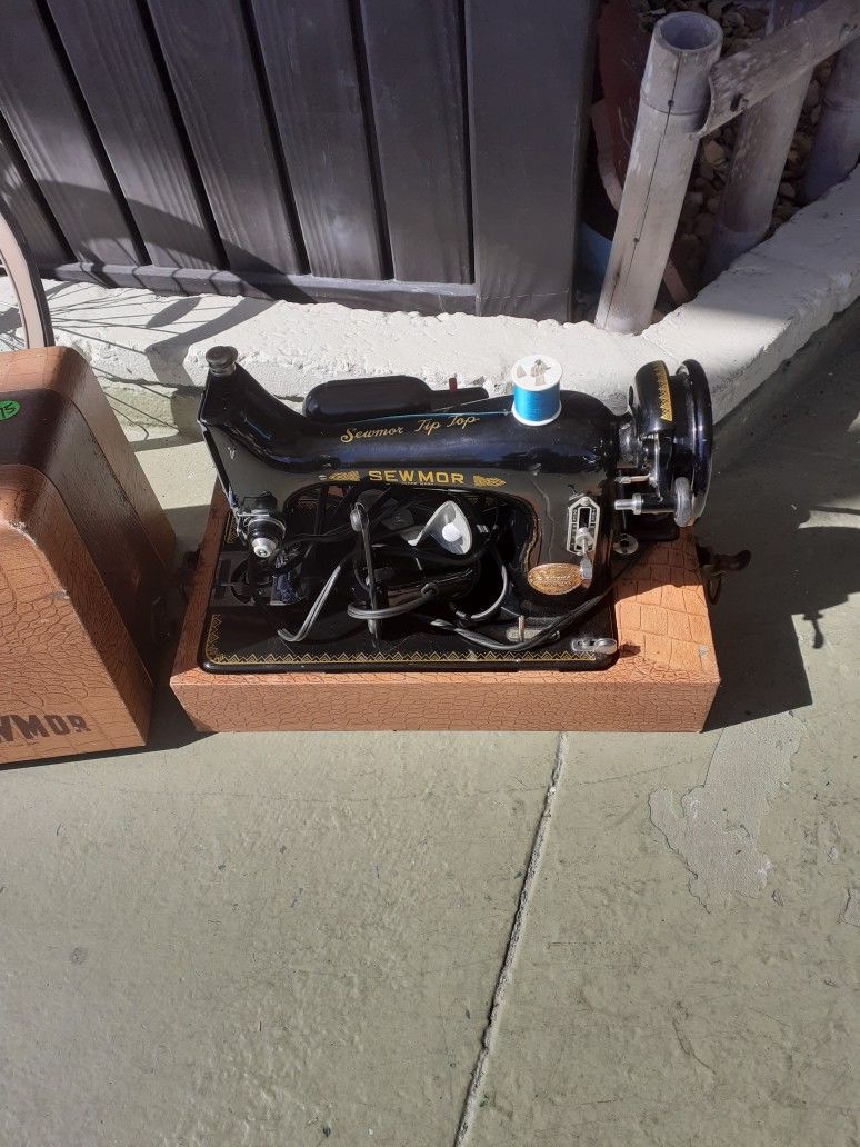 Antique sewing machine in Carrying Case