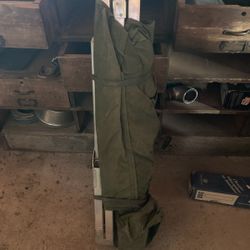 Morning. Two military type cots with aluminum legs. Very sturdy.