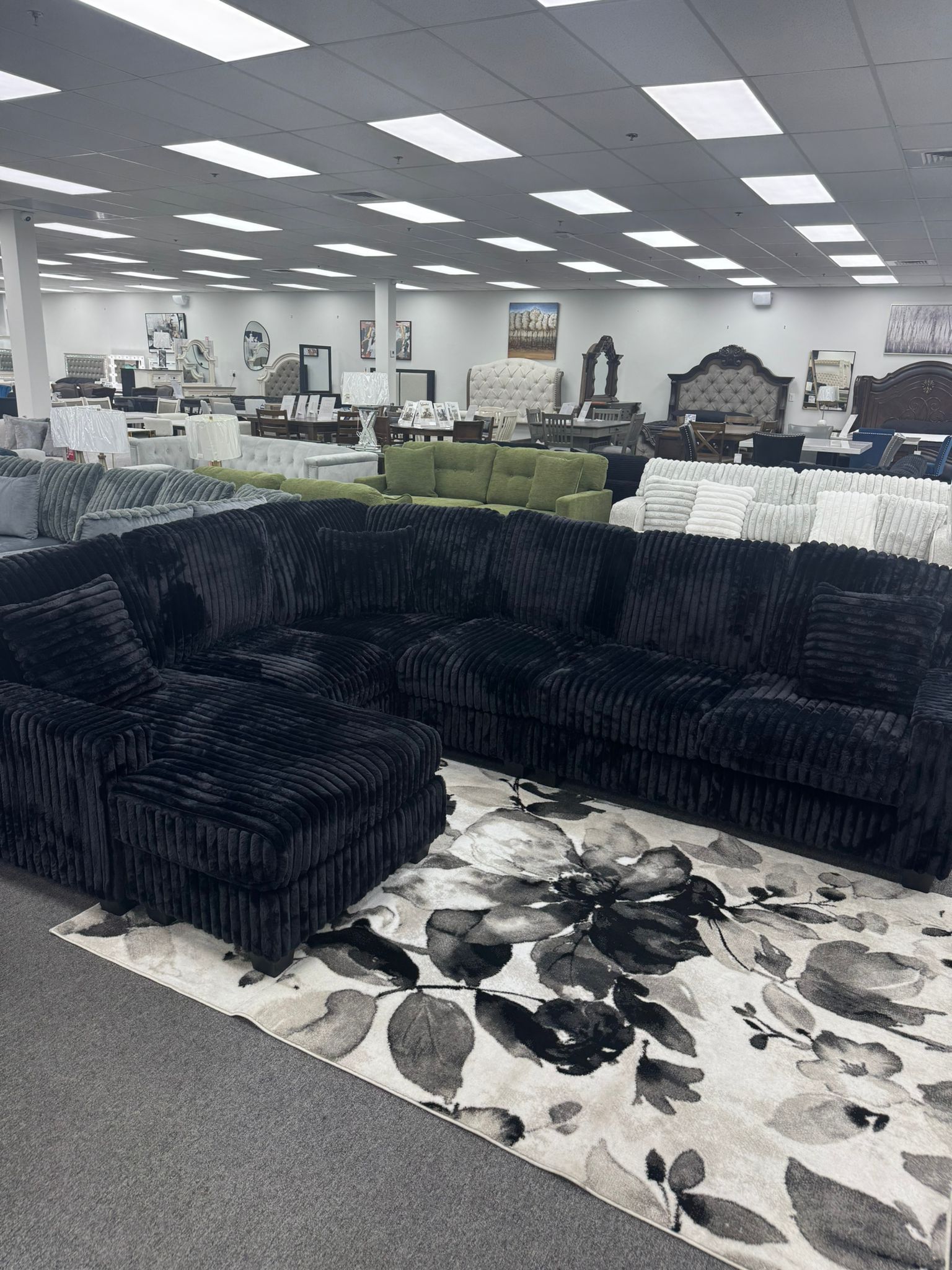 June Promotion Elevate your living space with this Black Luxurious black sectional