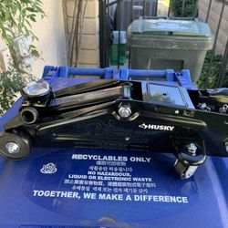 Husky 2 Ton Trolly Floor Jack. New In It’s Original Box, Never Used.
