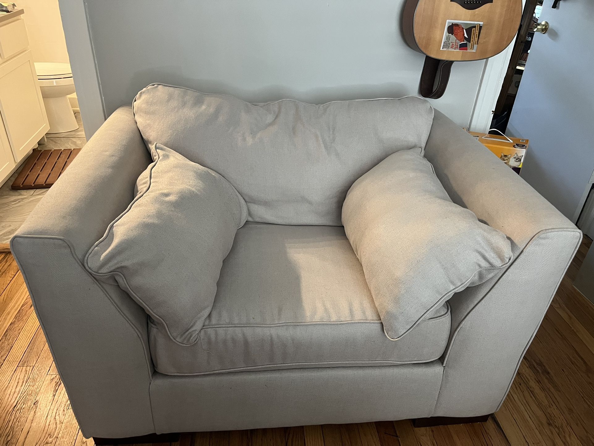 large cream sofa chair + ottoman