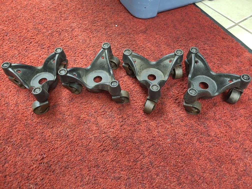 4 Piece Set Of Antique Cast Iron Furniture Moving Dollies