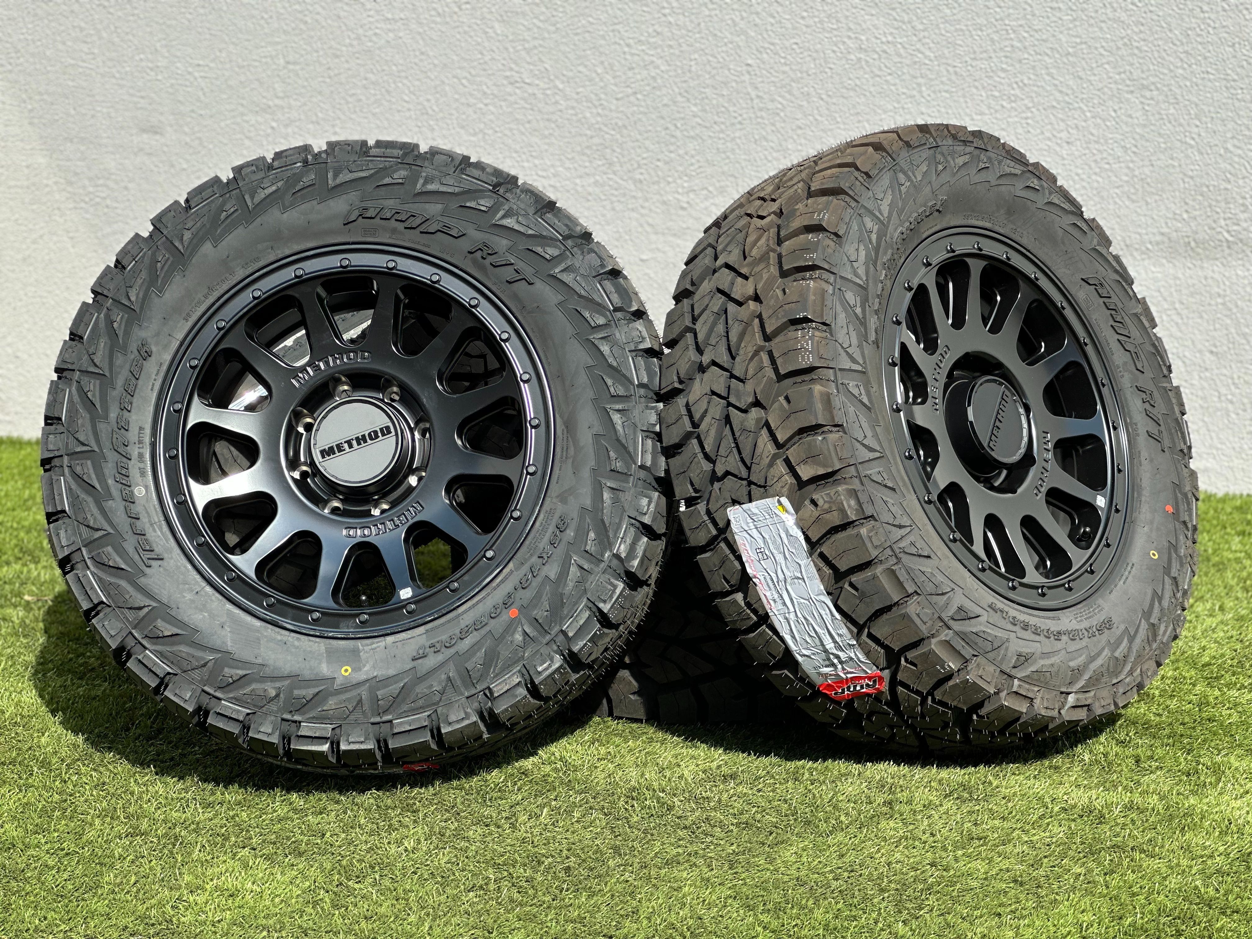 New 20” Method 709 Rims 8x180 Chevy Silverado 2500 Wheels AMP 35x12.50R20 R/T Tires GMC Sierra 3500