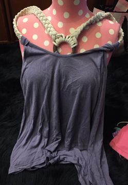 Woman’s small purple shirt