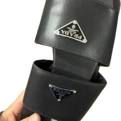 Prada Triangle-logo leather slides