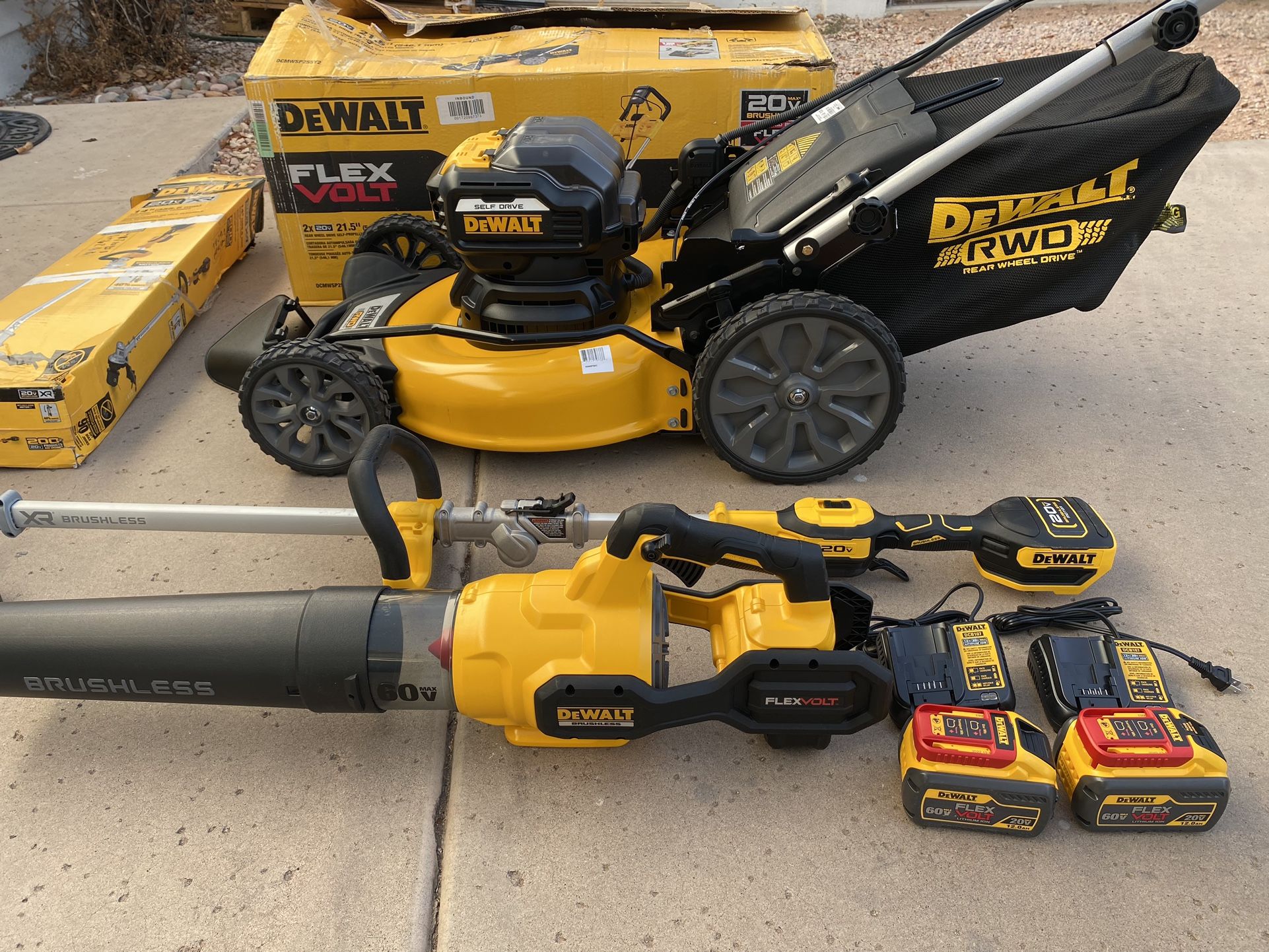 20V Dewalt Combo (21” Lawn Mower, 14” Folding String Trimmer, Leaf Blower, Two 12AH Batteries And Two Chargers