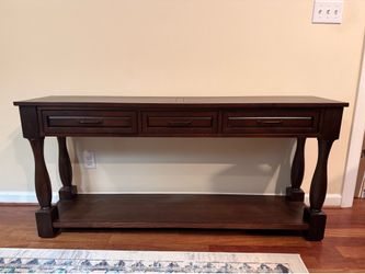 Large wooden sofa table.