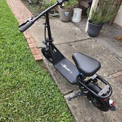 scooter Common with Charger. Good condition