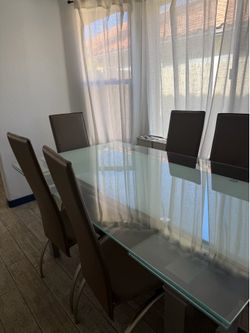 Glass Table with extendable leaflets