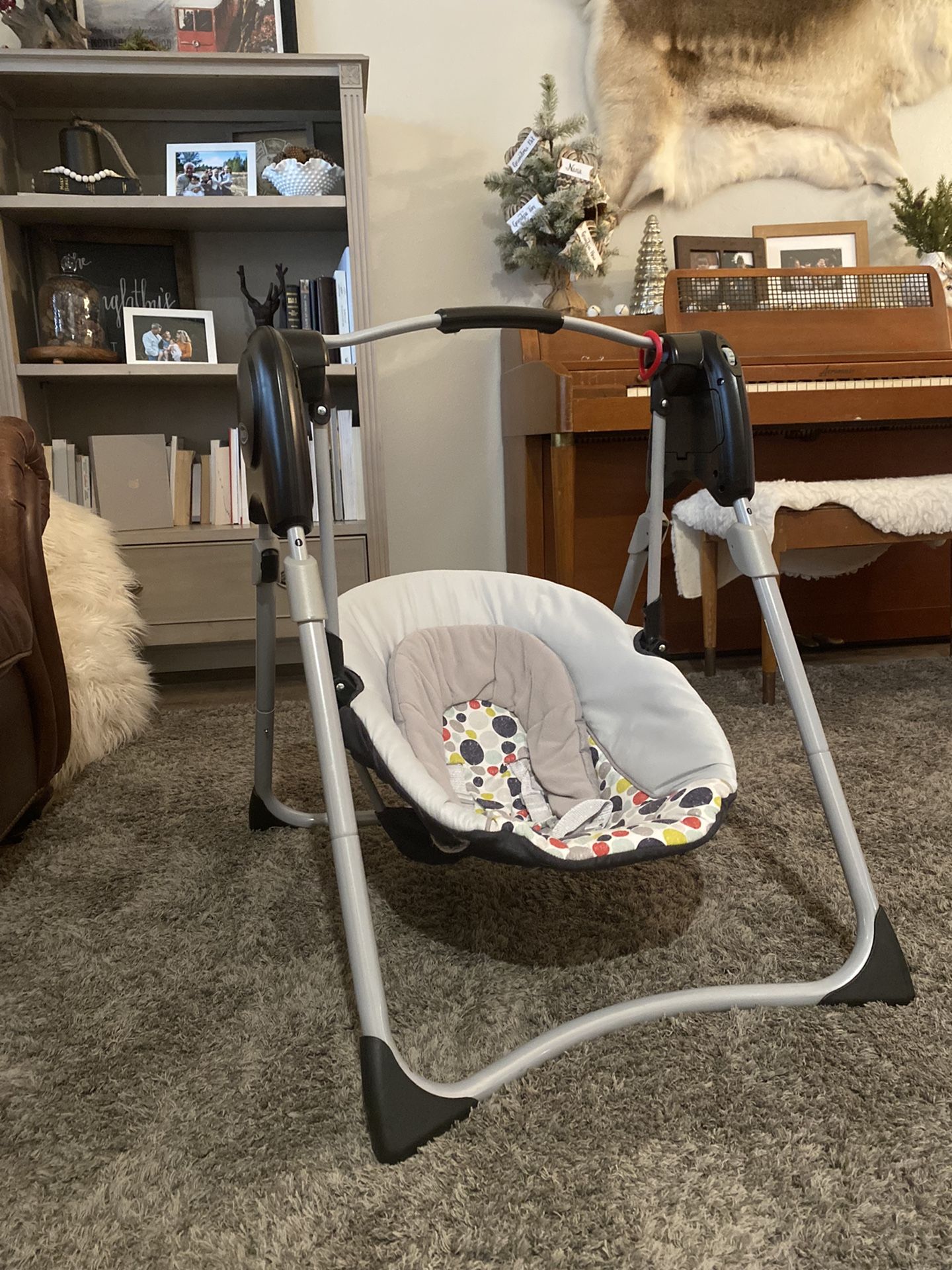 Multiple Baby Items: Baby Swing, Baby Bouncer, Baby Jumper, and Baby Walker