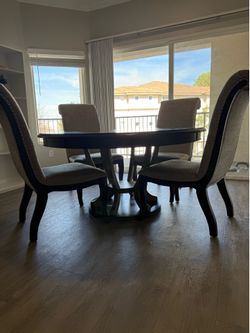 Modern Round Dining Table Set (5-Piece) – Dark Wood + Upholstered Chairs
