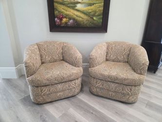 2 custom swivel barrel chairs