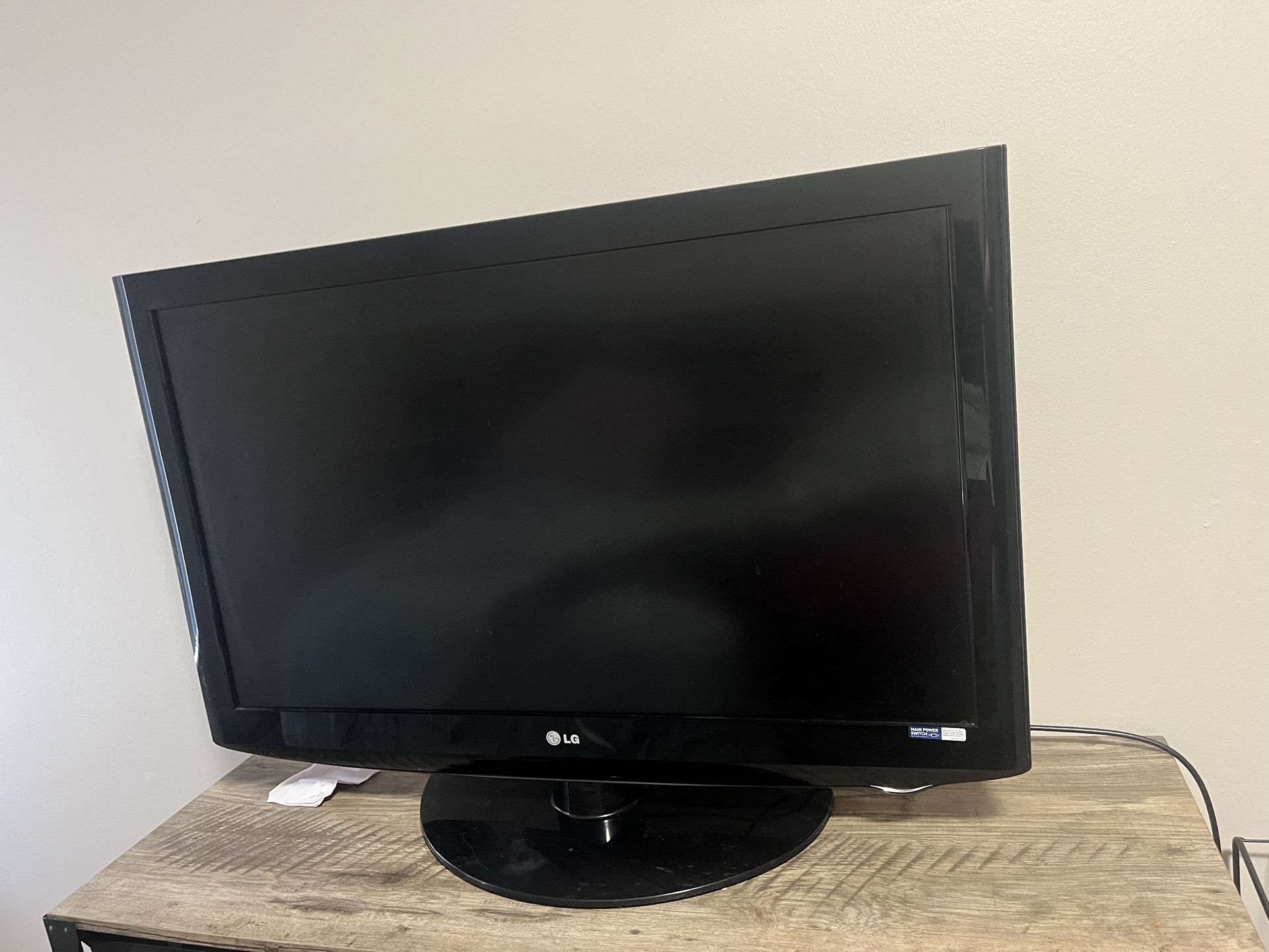 LG 57in’ TV with Stand & roku