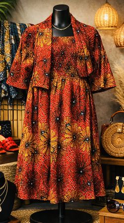 confidence with this beautiful African print dress, designed with vibrant colors and bold traditional patterns. Made from high-quality