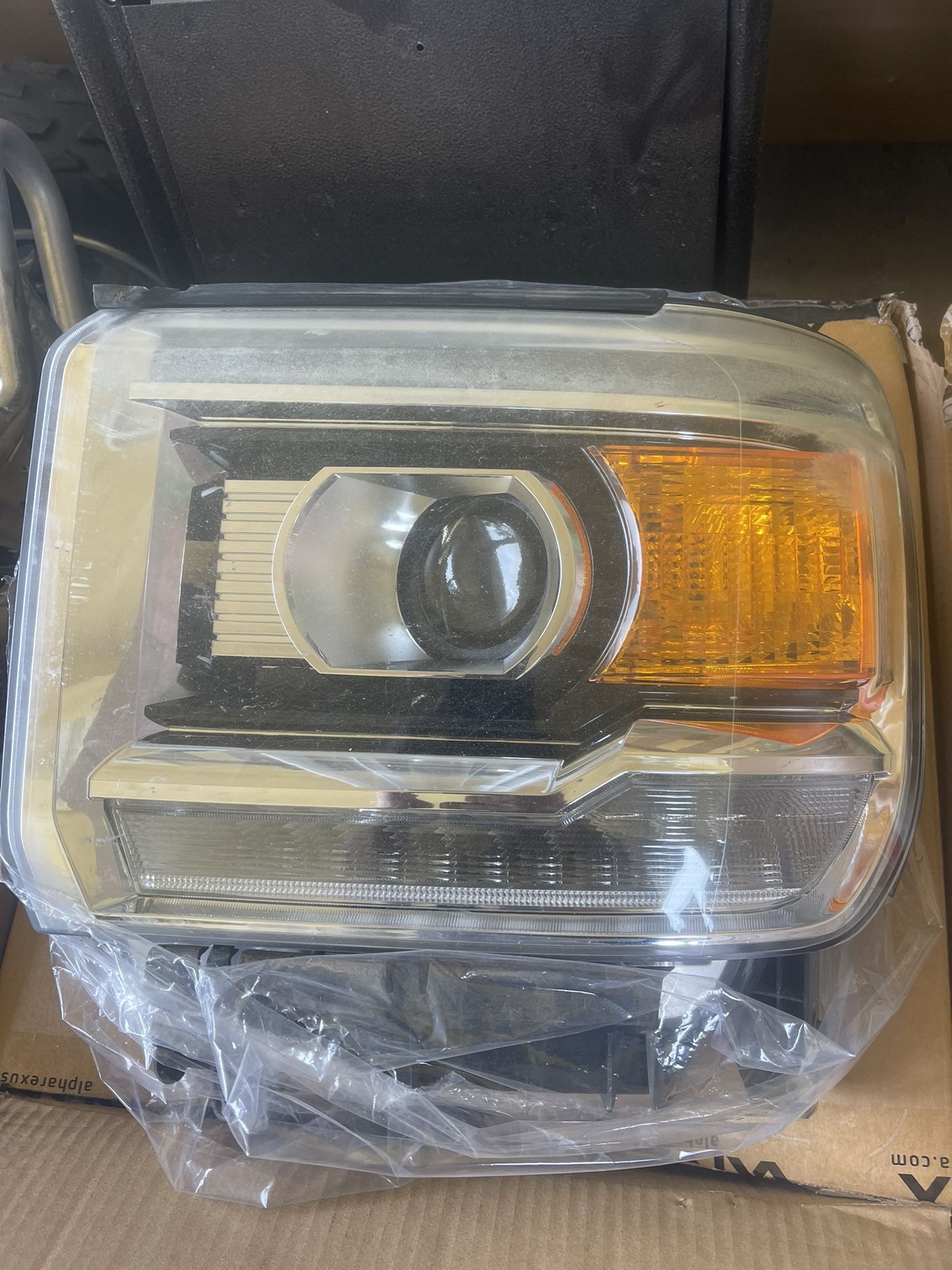 2014 GMC 1500 Headlights OEM