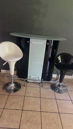 Bar stand comes with two Chairs need it gone