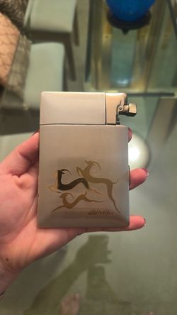 Vintage cigarette holder and lighter brass finish