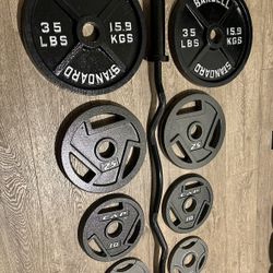 BRAND NEW Olympic Black Curl Bar With Pairs From 5s To 35s (Total: 175 lbs)