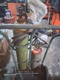 Oxygen/accedelyn tanks on dolly