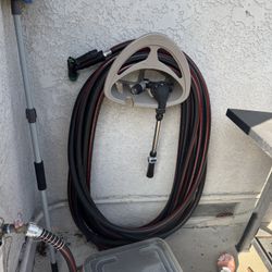 Water Hose With Wall Attachment $40