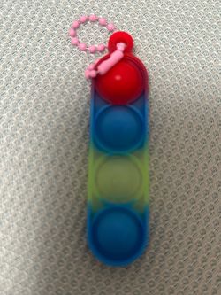 A pop it with a keychain