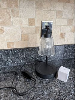Candle warmer with extra light bulb