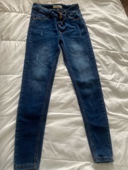 Blue Skinny Jeans with Distressed Detail