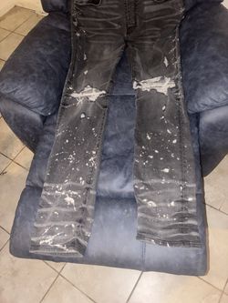 AMIRI black distressed
