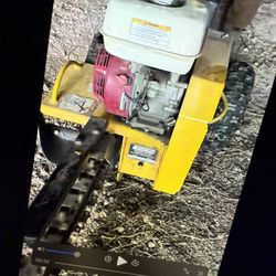 Ground hog walk behind trencher 