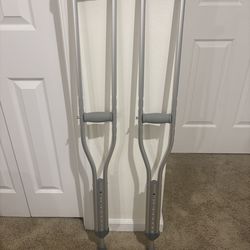 Adjustable crutches