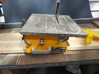 Ceramic tile cutter working fine only need a water tray