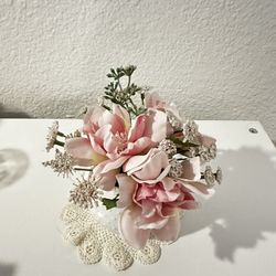 Small Pink Flowers In White Vase