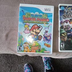 Wii Games Super Paper Mario And Super Smash Bros Brawl 2 For 10.00 Dollar