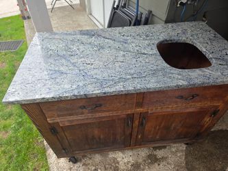 Real Marbel outside island/BBQ island with wheels and 3 drawers and opening  for either a trash bin are what ever.