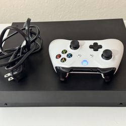Xbox One X includes 1 Controller HDMI Cable And Power Cord (0 Games Included) 