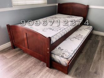 Twin/twin size Cherry trundle bed with orthopedic mattress included