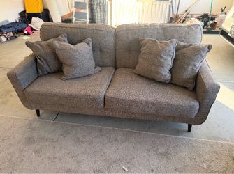 Free couch on good condition used only in my office
