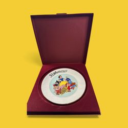 commemorative collector's plate celebrating the 50th anniversary of Disney's Snow White and the Seven Dwarfs.  T-400