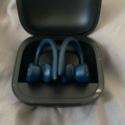 powerbeats pros black case with blue headphones,bluetooth